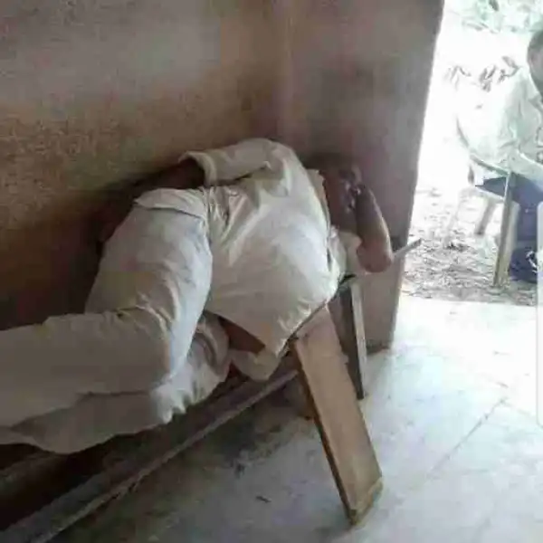 Hilarious Photo Of The Day: Man Supports His Big Belly While Sleeping